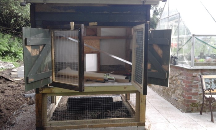 double back doors to coop for extra security, easy airing and cleaning