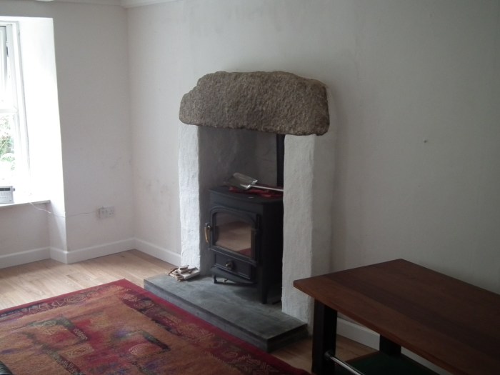 New fireplace with woodburner installed