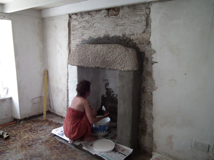 Me painting the fireplace